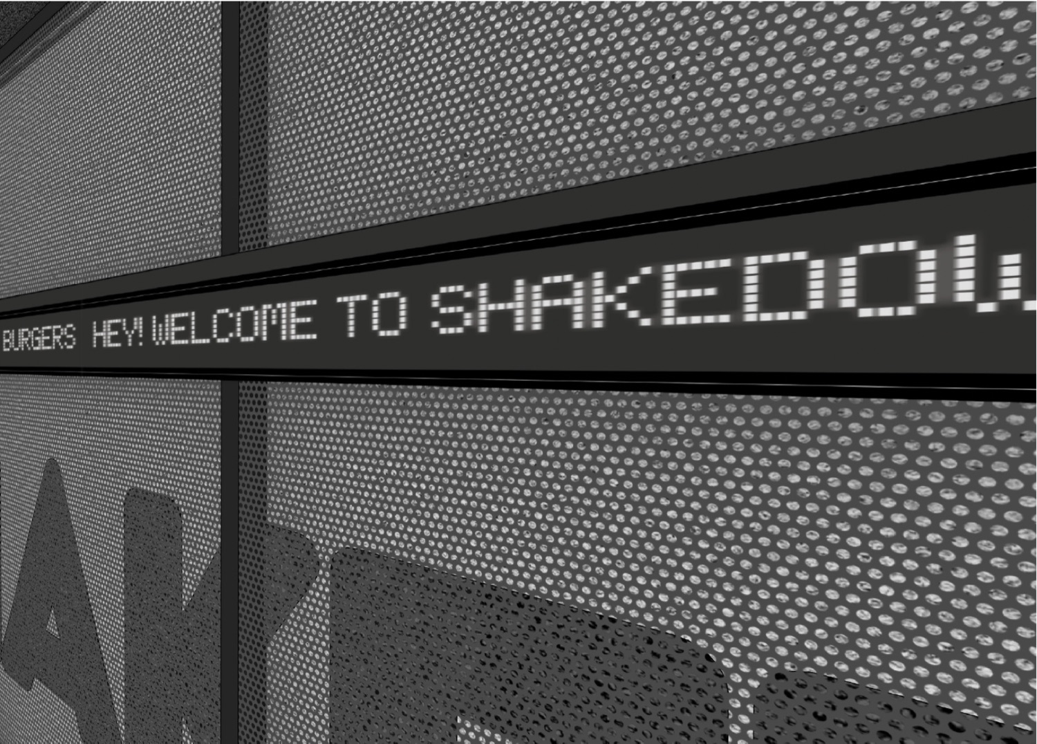 Concept close-up of the ticker text running across the perforated mesh wall
